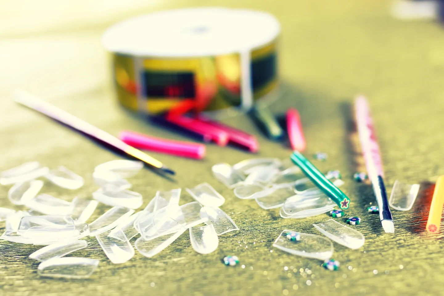 Use sticky tabs to adhere your reused press on nails