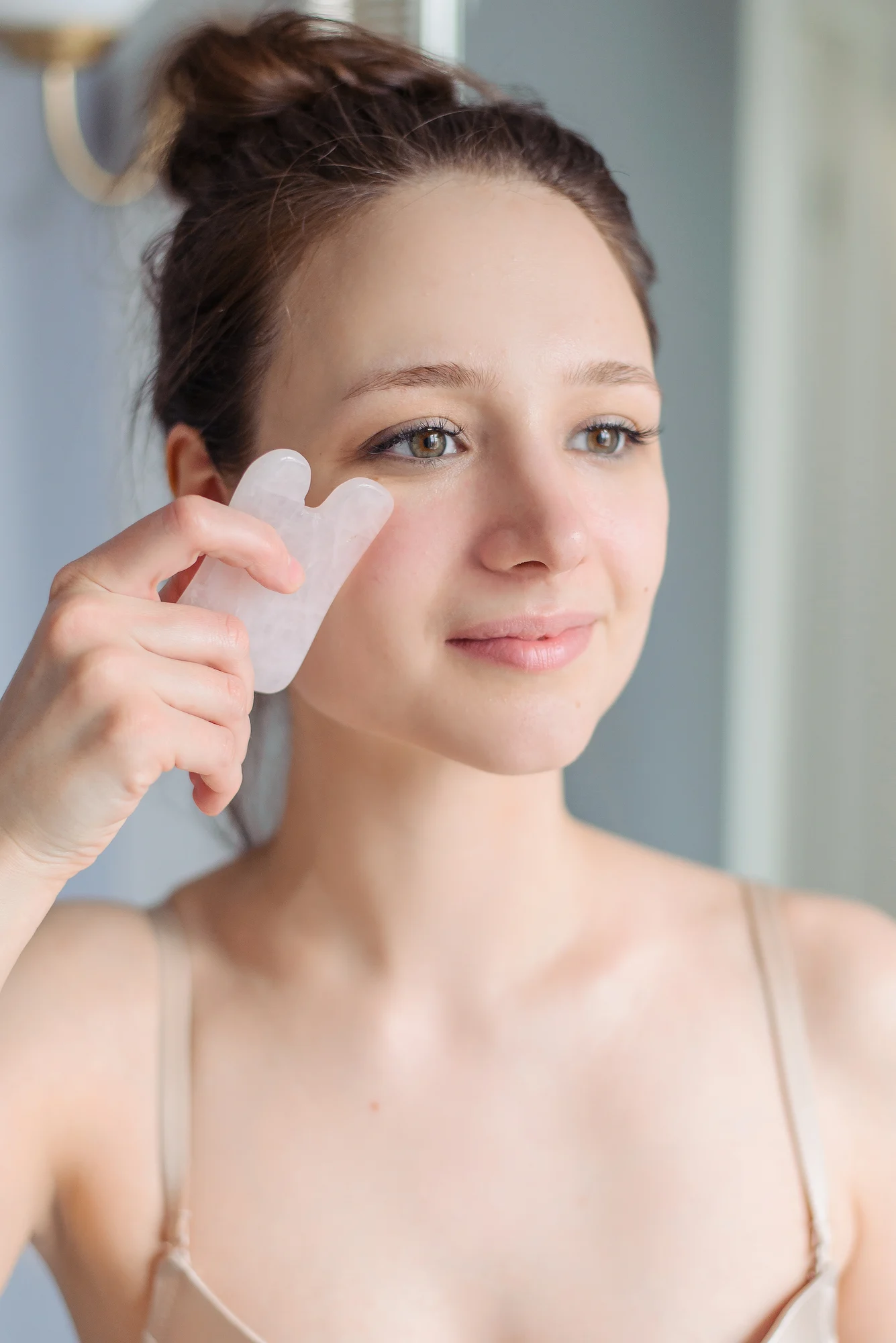 Can You Use A Gua Sha To Slim Down Your Double Chin?