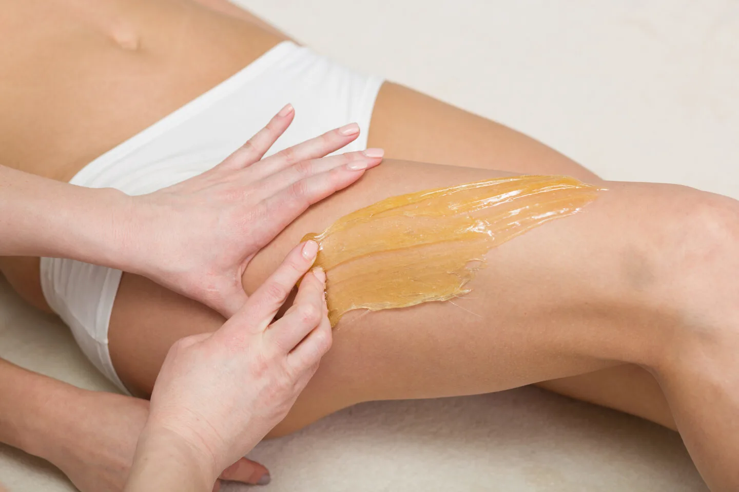 How painful is the sugaring hair removal process?