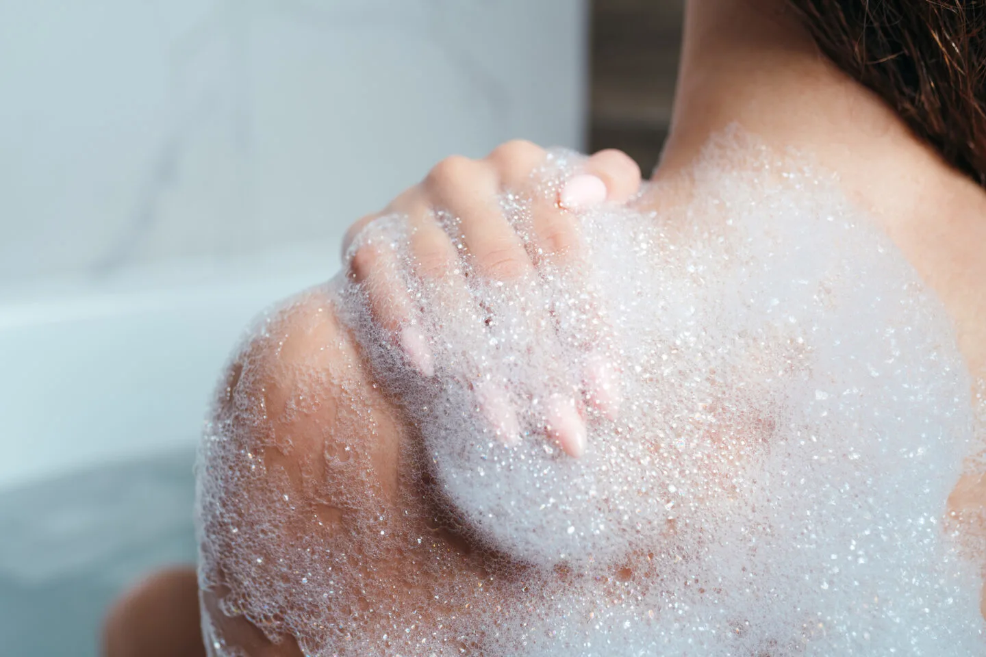 How Often Should You Exfoliate To Prevent Skin Peeling After Showers?