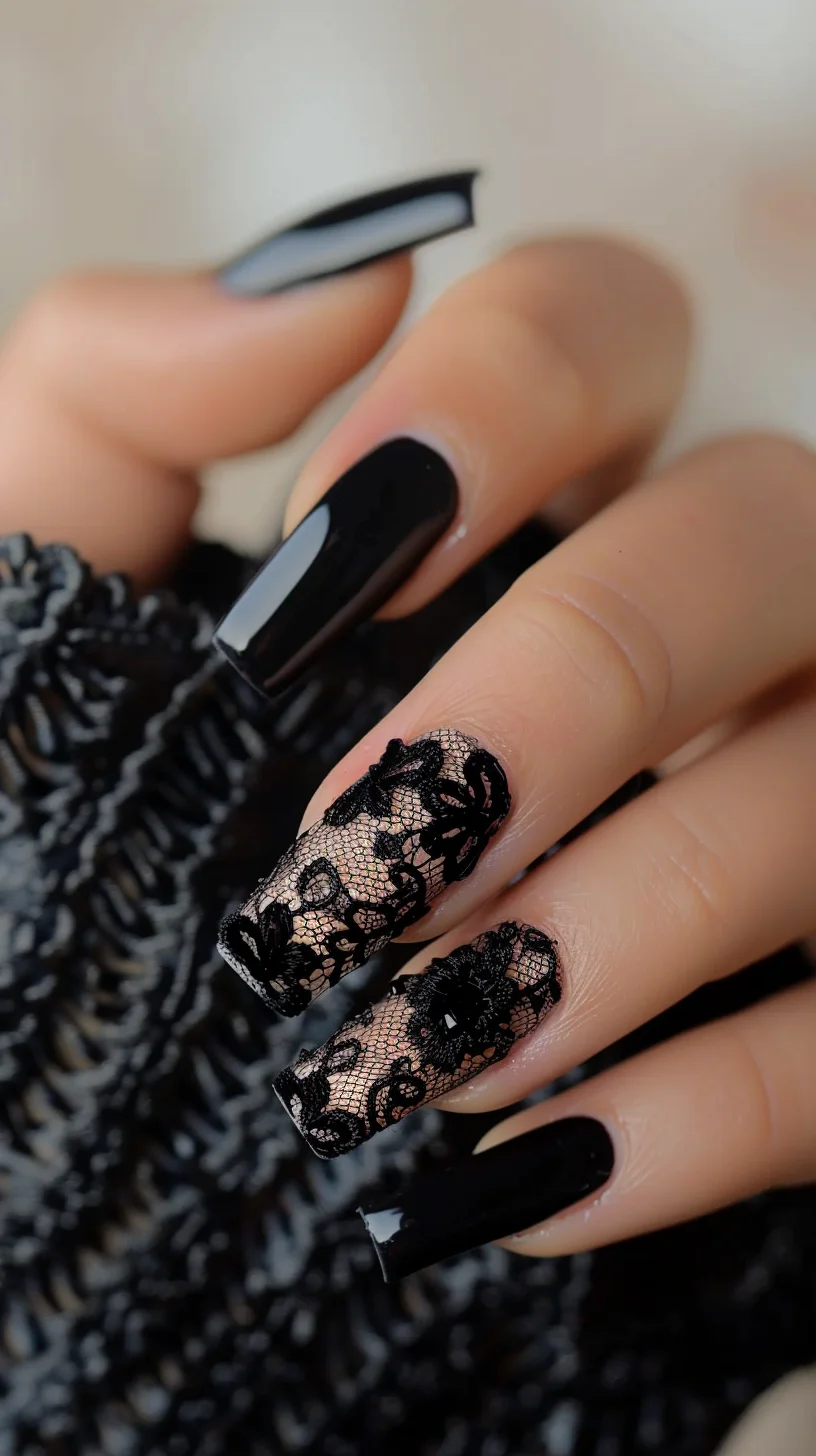 Glossy black nails are complemented by black lace designs on the middle and ring fingers, set against a nude base. The lace patterns feature floral and geometric elements, adding depth and texture. The long, square shape of the nails enhances the overall elegant and bold look.
