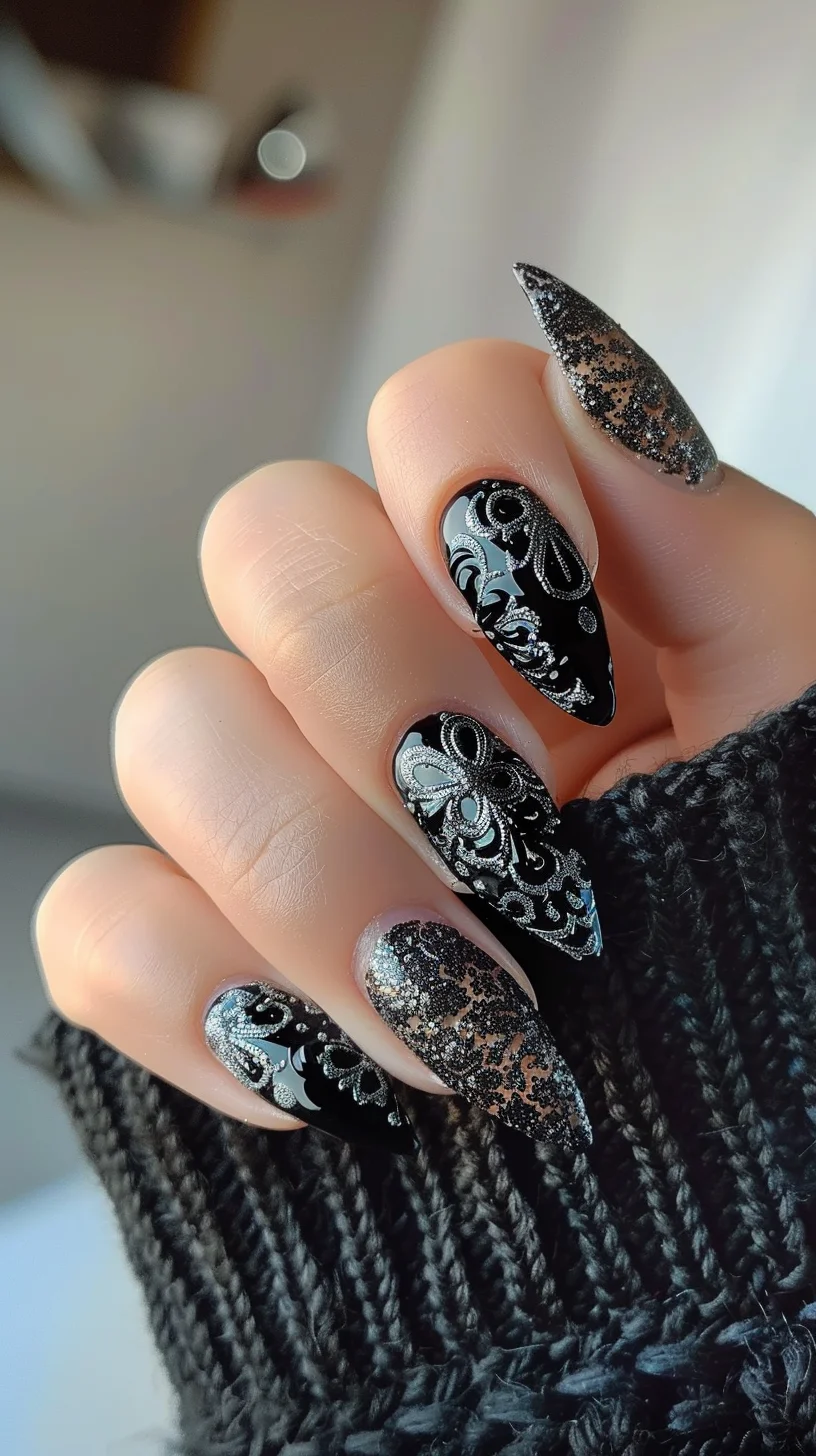 A mix of glossy black and glittery silver adorns these stiletto-shaped nails. The black nails are detailed with silver lace designs, while the glitter nails add sparkle. The combination creates a luxurious and eye-catching appearance.