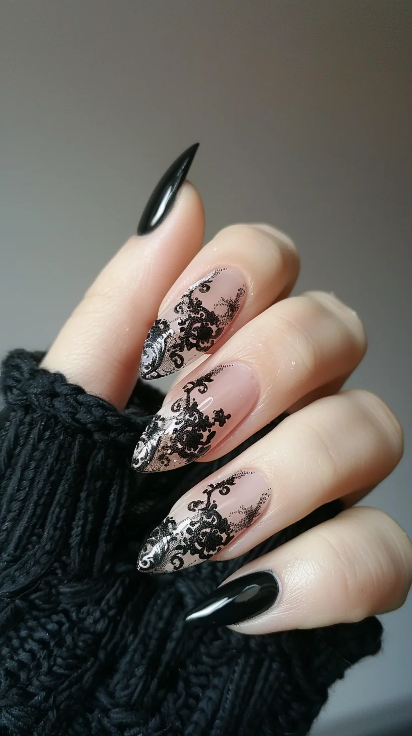 Nude base nails are decorated with delicate black lace patterns that include floral and geometric designs. The stiletto shape of the nails adds to the dramatic effect, while the black lace creates a striking contrast against the nude background.