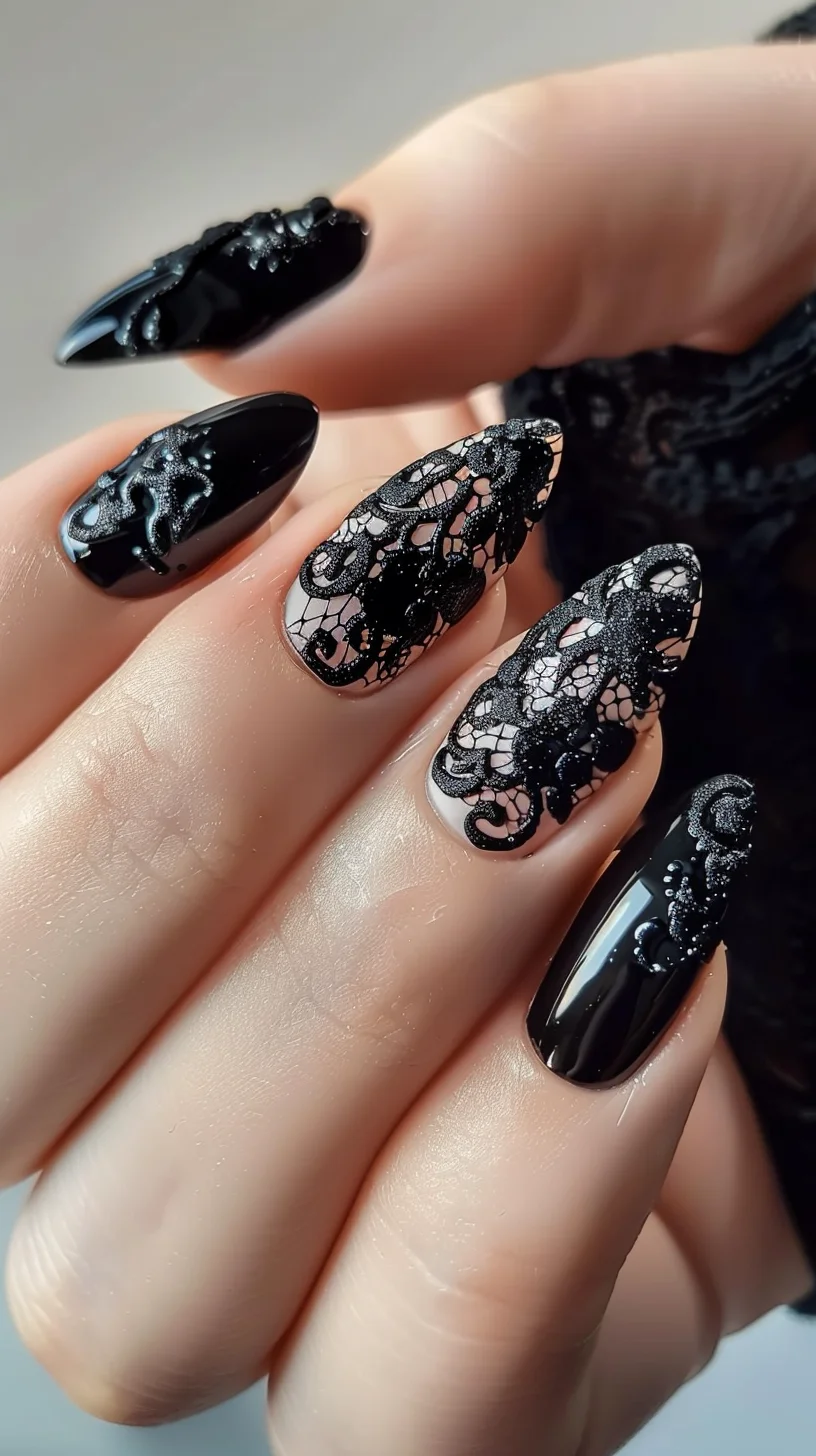 Featuring glossy black nails, this design includes intricate black lace patterns over a nude base on the middle and ring fingers. The lace has detailed floral motifs, creating a delicate and feminine appearance. The nails are long and almond-shaped.